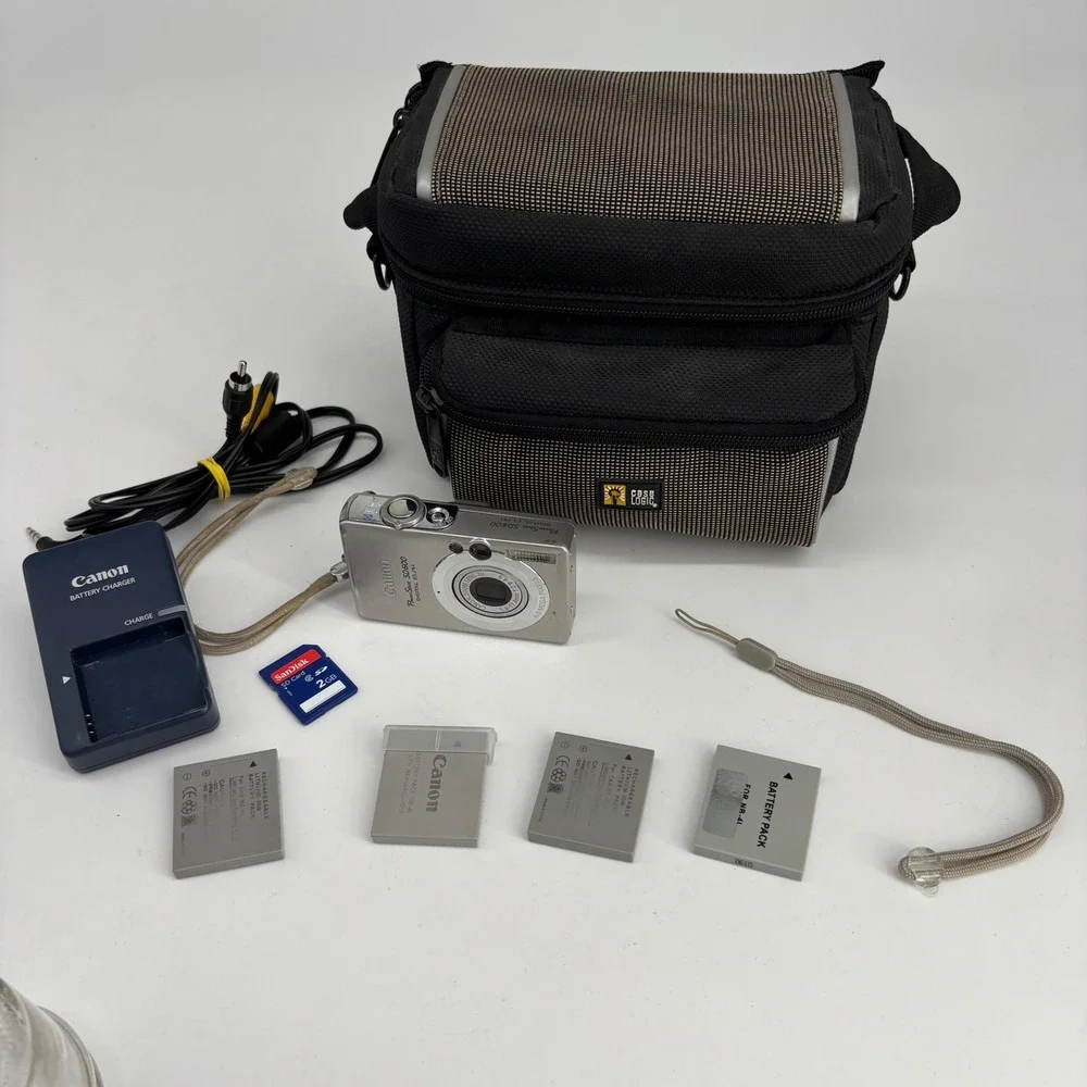 Canon PowerShot SD600 Digital ELPH Camera Silver 6.0MP Bundle Multiple Batteries